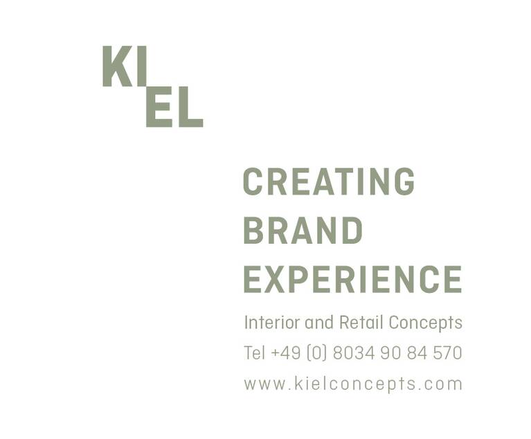 Logo mit dem Schriftzug 'KIEL' und darunter 'CREATING BRAND EXPERIENCE Interior and Retail Concepts Tel +49 (0) 8034 90 84 570 www.kielconcepts.com'